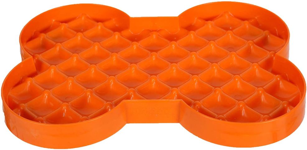 an orange slow feeder plate for dogs